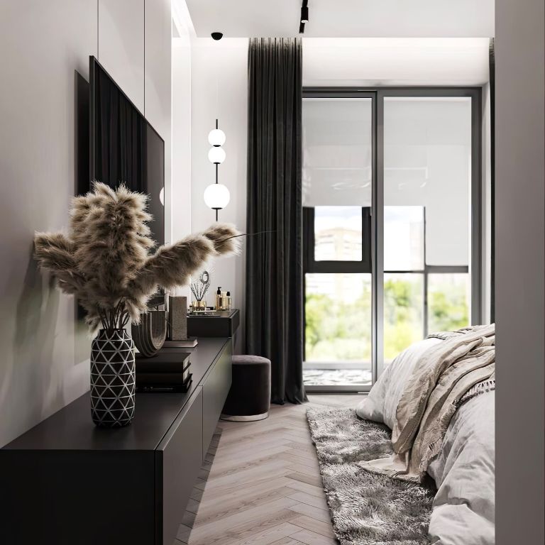 Modernes Schlafzimmer mit schwarzem Sideboard