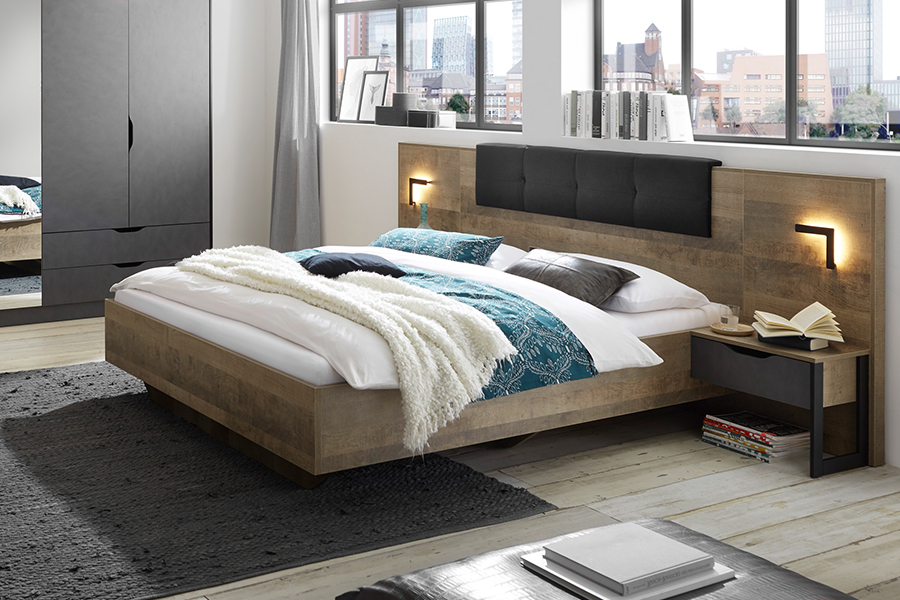 Schlafzimmer Bett aus Holz mit integriertem Polster am Kopfteil in schwarz aus der Möbelserie MALTA-61