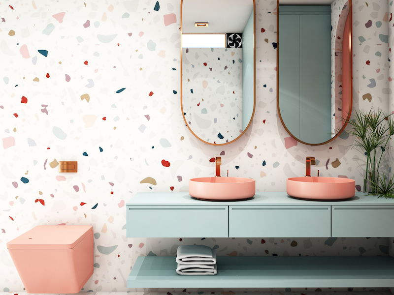 Badezimmertrend bunte Möbel mit Fliesen im Terrazzo Stil